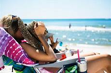 beach tanning tan woman sun leisure leg shoot vacation ocean hat beauty color model stock domain public