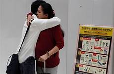 mother japan son mom so her leaves stay teen won reuters lifestyle choice born goodbye narita airport his children he