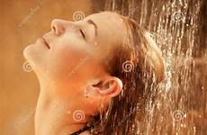 shower female taking outdoors take closed eyes girl attractive pleasure enjoying spray spa warm resort luxury water cute stock