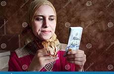 arab muslim money woman gold confused preview