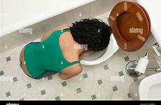 toilet vomiting woman down young stock into alamy
