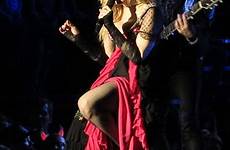 madonna her fan concert down she bare breast singer exposes pulls female stage top fans dress pulled show showing sultry