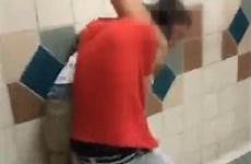 school teen bathroom boys high floor toilet cold their three brawl knocked brutal two sound stalls onto being after crunching