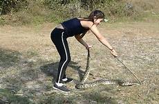 snake playing girl videos giant saved top