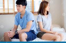 having argument unhappy conflict relationship problem couple bedroom bed asian young family preview