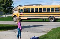 bus school girl goodbye waving stop stock woman young shutterstock