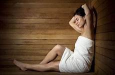 sauna sweaty woman hot towel express