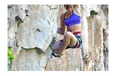 girls climbing rock