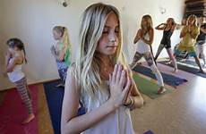 yoga girl instructor youngest devoe teacher years spa teaches san class classes female her article masslive yogis encinitas diego local