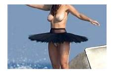myla dalbesio topless shoot scenes behind nude illustrated swimsuit sports model below