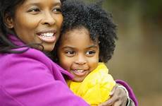 mother african american raise sons moms healthy plan need hugging child essence getty
