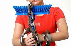 tied woman blond chained chain young bound house captive household working slave stock arrested alamy broom work