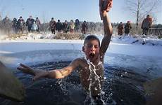boy epiphany ice water cold village orthodox week belarus lake breathtaking around most enjoying