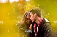 love passionate stock alamy over folding lips chest flirting staring kiss outfit gray showing camera heart sign background