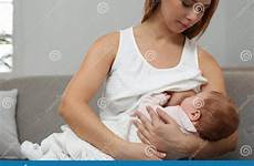 breast feeding her woman young baby little women