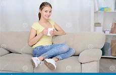 sitting coffee drinking woman couch young dreamstime girl preview person