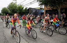 solstice fremont parade cyclists buns participate genna seattlepi 31st