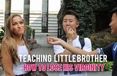 brother teaching little girls