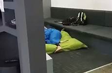 couple caught sex camera under blanket public act room middle inside moment campus online beanbag sprawled spontaneous passion seen they