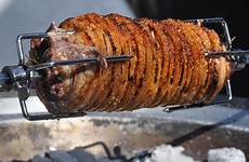 pork spit roasted belly fire food roast porchetta cook charcoal grill recipes rotisserie leg minutes after visit roll cooked over