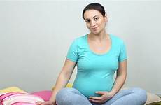 pregnant sitting woman young pregnancy prev