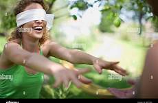 blindfolded alamy wife stock husband woman