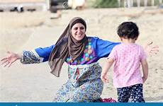 muslim hug girl egypt baby mother arab happy her smiling egyptian beach africa arabian preview