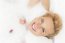 relaxing blond foamy bath portrait female cute