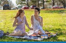enjoying each others company picnic fall day couple gorgeous during models two