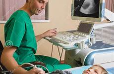boy abdomen doctor analyzing patient ultrasound preview