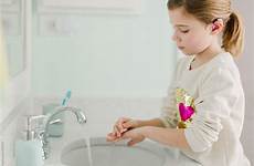 washing girl hands