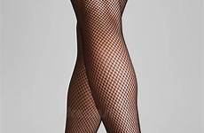 fishnet legs closeup negras largas femeninas piernas alejarse delgadas posterior