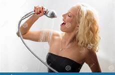 shower having fun woman pretending sing