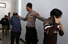 sex men indonesia gay having caning indonesian people two sentenced being each courtroom party sharia other asia police trial aceh