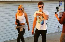 zac efron miro sami kisses girlfriend lovely busy chatter