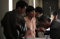 national torture security korea 1985 ji korean scene film young shirtless movies graphic chun dong chung depicts any kotzathanasis panos