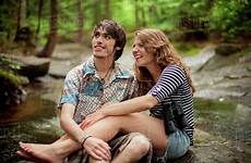 couple barefoot forest sitting boulders dissolve stock royalty d145