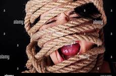 tied woman screaming abuse alamy stock concept