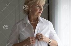 dressed woman getting elderly standing preview