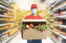 delivery grocery food supermarket service worker holding order company box