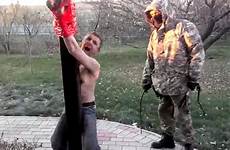 ukraine soldiers man alive video russian dead ukrainian burying whipped donetsk russia drug been shows dealer footage region horrific