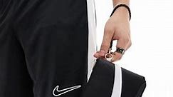 Nike Icon Blazer large wristlet bag in black and white | ASOS
