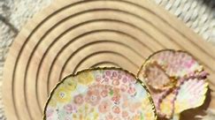 The most spe-shell DIY for summer – decoupage seashells. 🐚 Grab some seashells, Mod Podge, gold paint, a brush, and floral napkins to recreate these beauties. 📷: feliciaheesen on TikTok #evite #diy #seashell #shells #party #decor | Evite