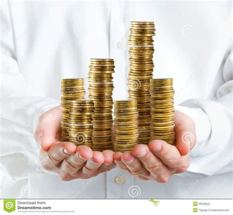 Maybe you would like to learn more about one of these? Stack of money in hands stock photo. Image of accounting - 33529520