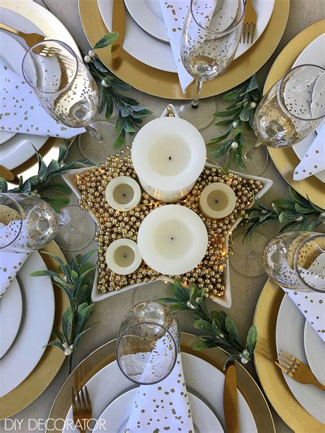 Forego traditional napkin rings and opt for soft florals, like thistle and eucalyptus, knotted together with leather cord instead. A Gold Christmas Table Setting - DIY Decorator