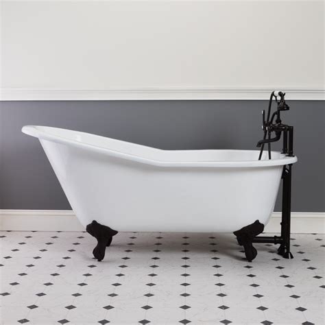 White bathroom with black cast iron tub, patterned floor tile. Mila Cast Iron Slipper Clawfoot Tub - Rim Faucet Drillings ...