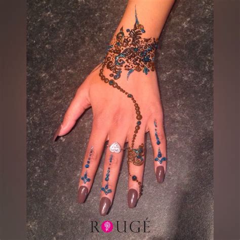 In indian culture, henna tattoos are viewed as cosmetic rather than religious. Bracelet & chain theme | Hand henna, Henna hand tattoo ...