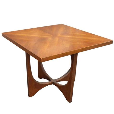 Well you're in luck, because here they come. Vintage Mid-Century Broyhill Brasilia Side Table at 1stdibs