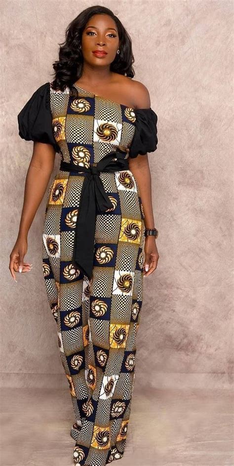 Une belle femme black se fait monter par son conjoint. 20 exemples de coutures africaines chics de nos jours | Mode africaine robe, Robe africaine ...