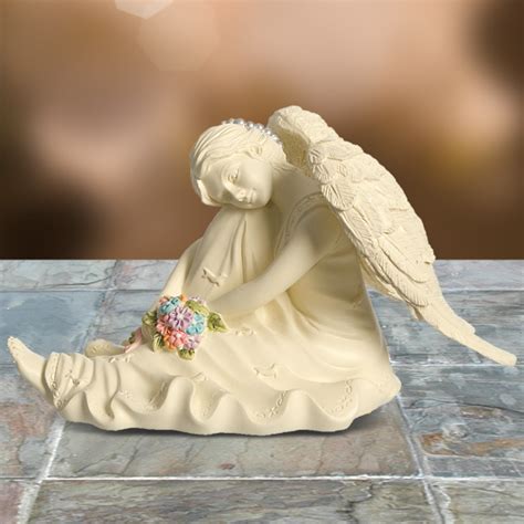 Sympathy flowers, bouquets and arrangements. Platinum - Serene Angel - Keepsakes | The Sympathy Store ...